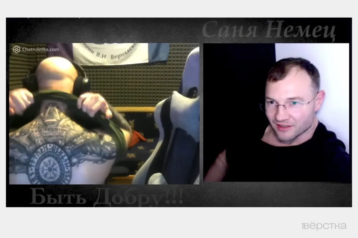 Yevgeny Vyunikov shows his tattoos to the video blogger “Sanya Nemets.” (Sanya the German)